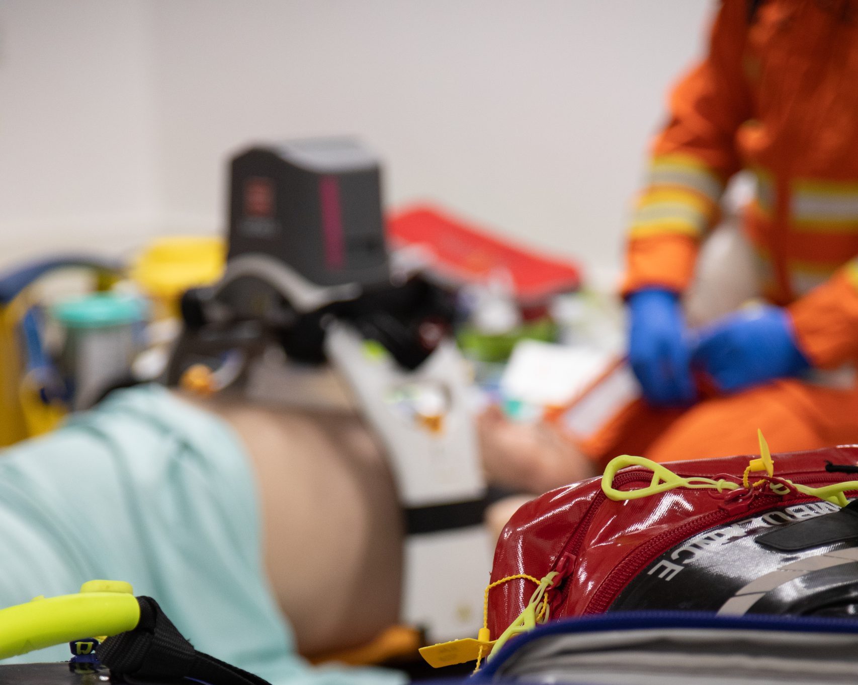 patient being treated with kit bag in view