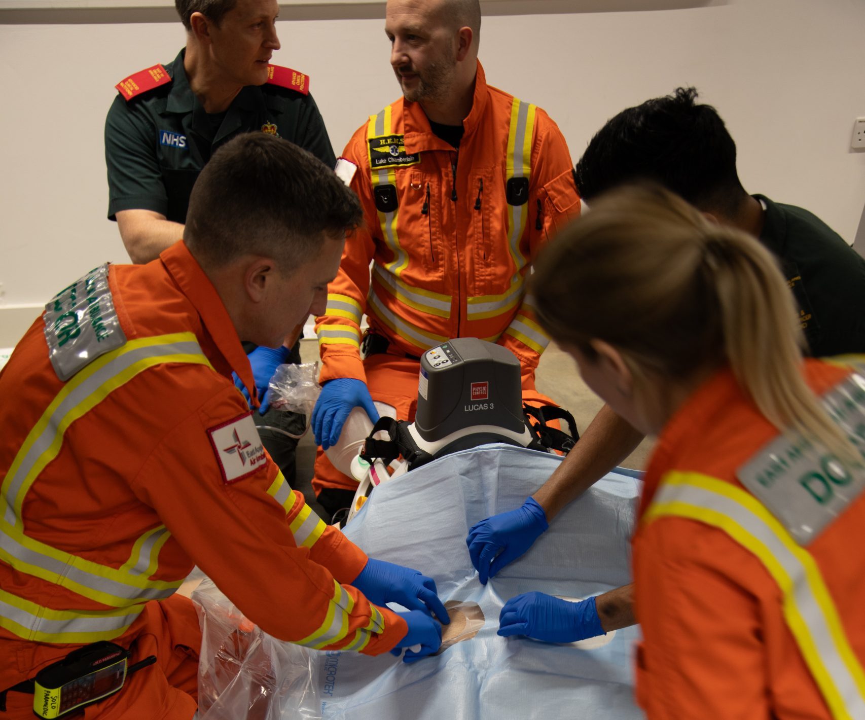 doctor and paramedic treating patient advanced care