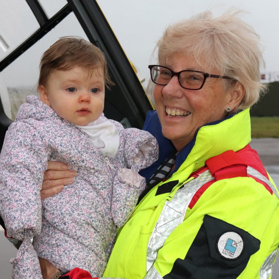 EAAA's Dr Pam Chrispin holding baby Willow.