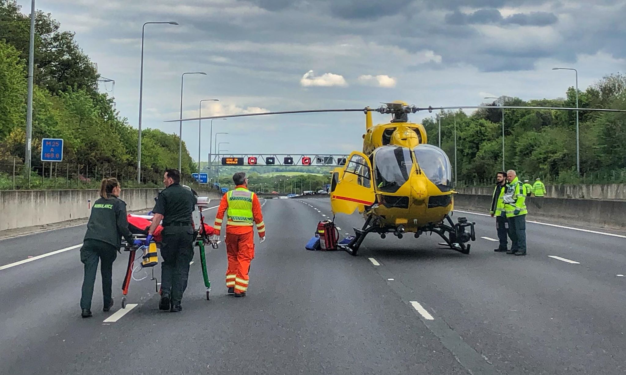 helicopter land on motoway at road traffic collision