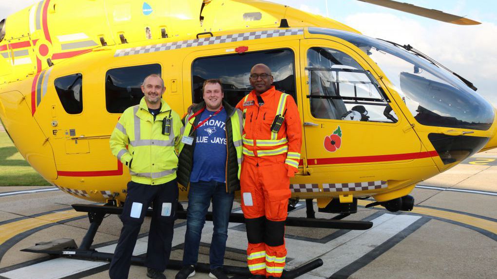 Former patient Jordan Greenwood with Pilot Steve Norris and Doctor Victor Inyang