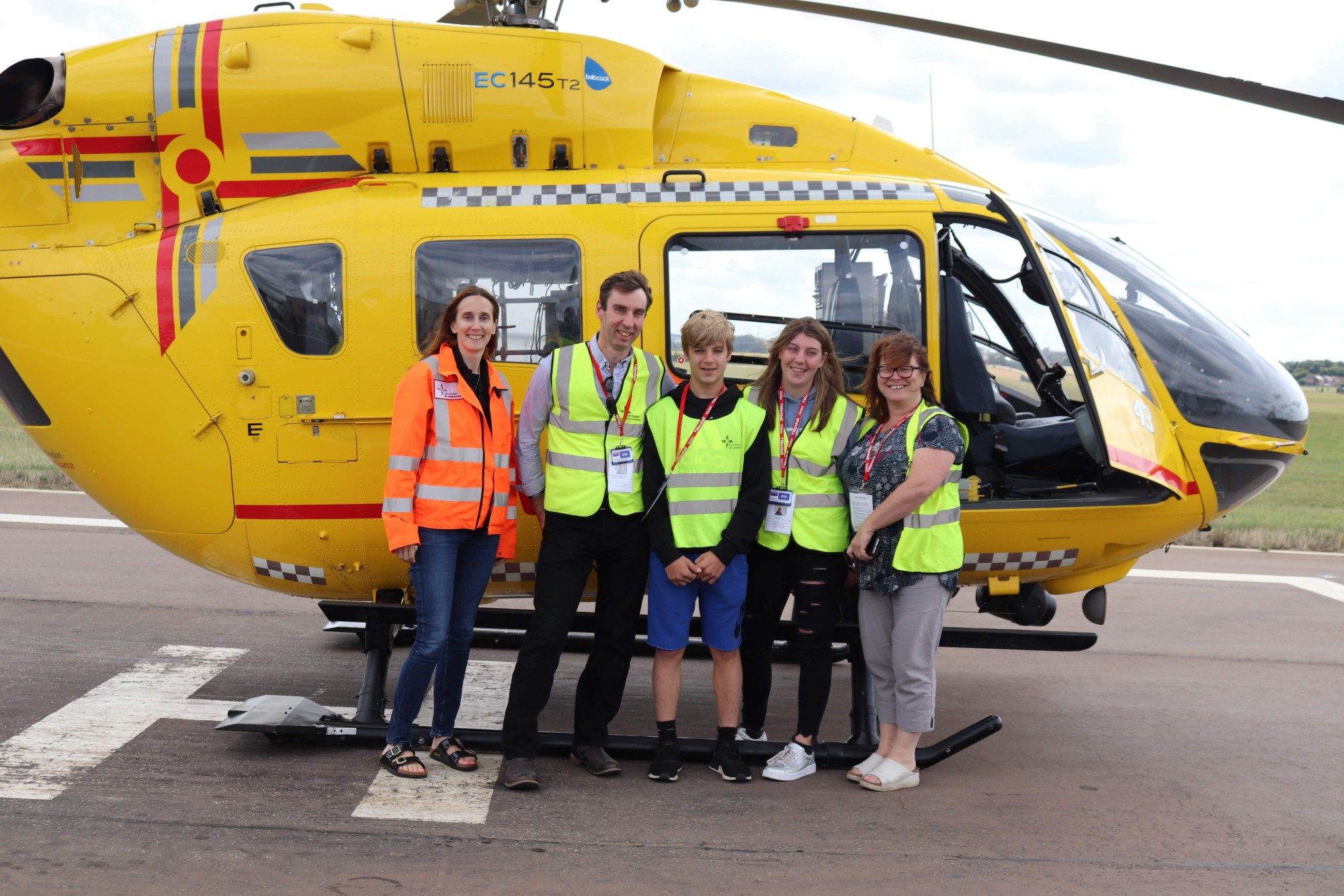 Nigel Sillis and his family with Helicopter and Dr Sarah McNeilly