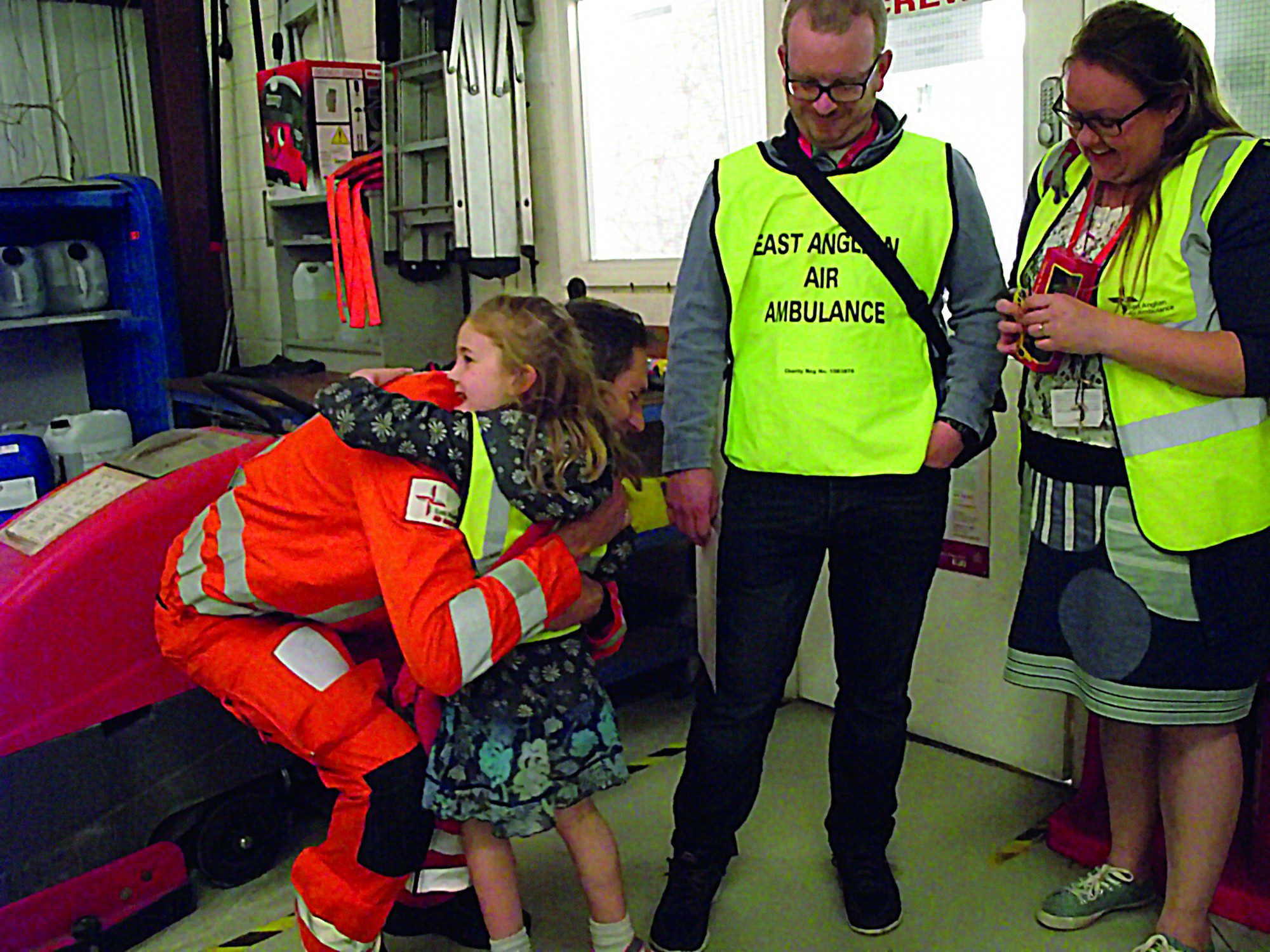 Tilly meeting and hugging EAAA paramedic Neil Flowers