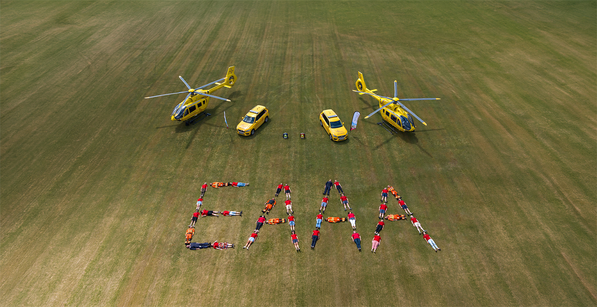 staff spelling out EAAA