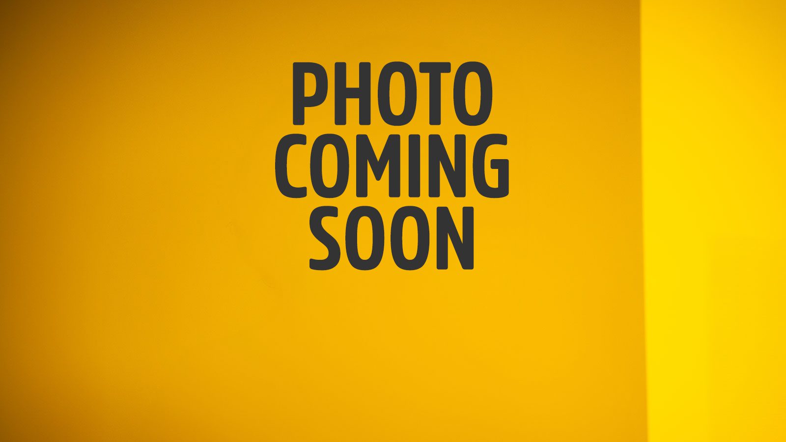 'Photo coming soon' written on a yellow background