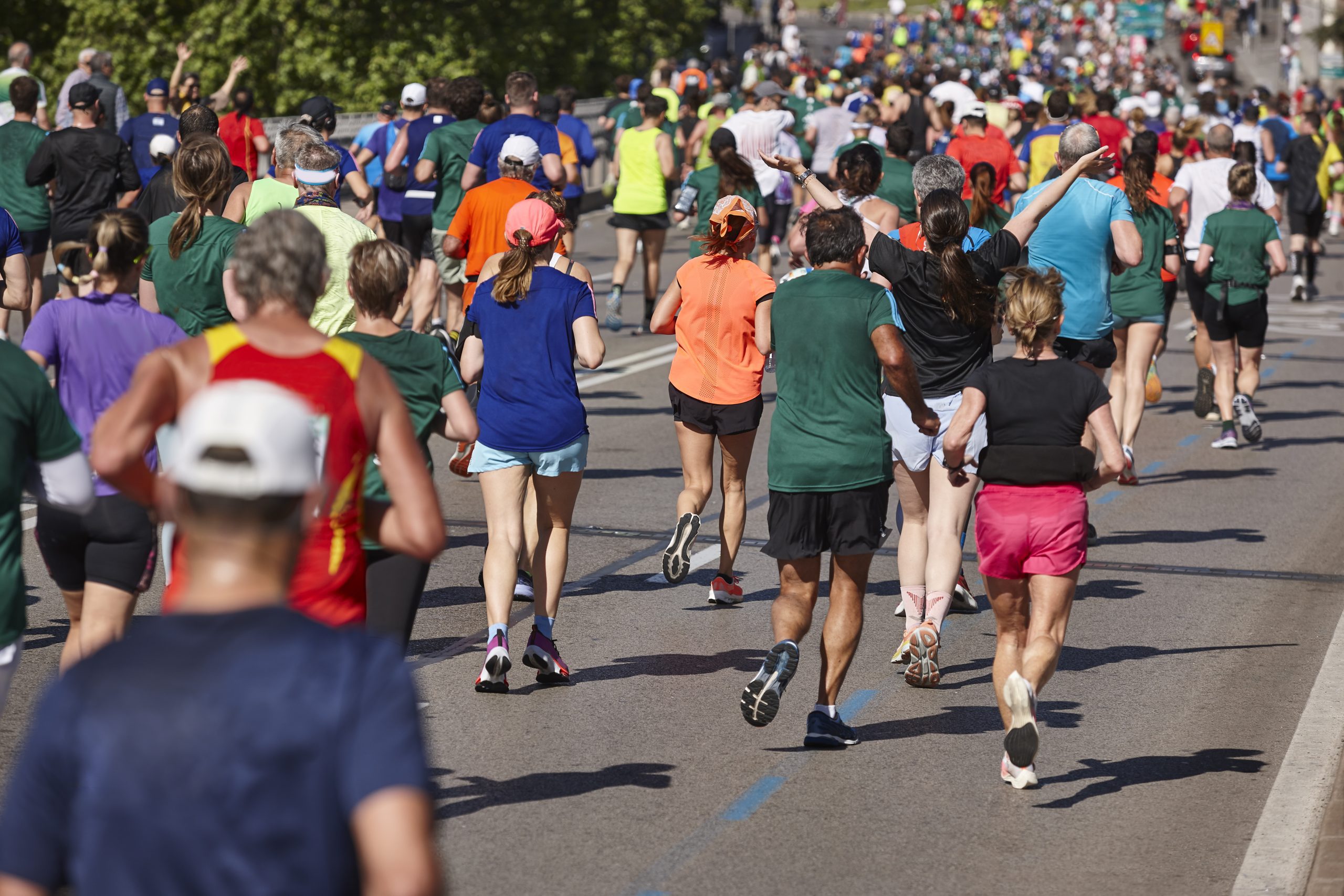 Runners on the street. Healthy lifestyle. Jogging exercise.