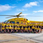 Lap of Anglia 2024 cyclists in front of the EAAA helicopter