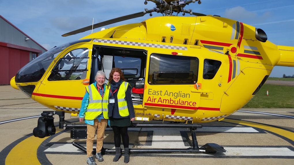 Patient Carol beside Anglia One helicopter