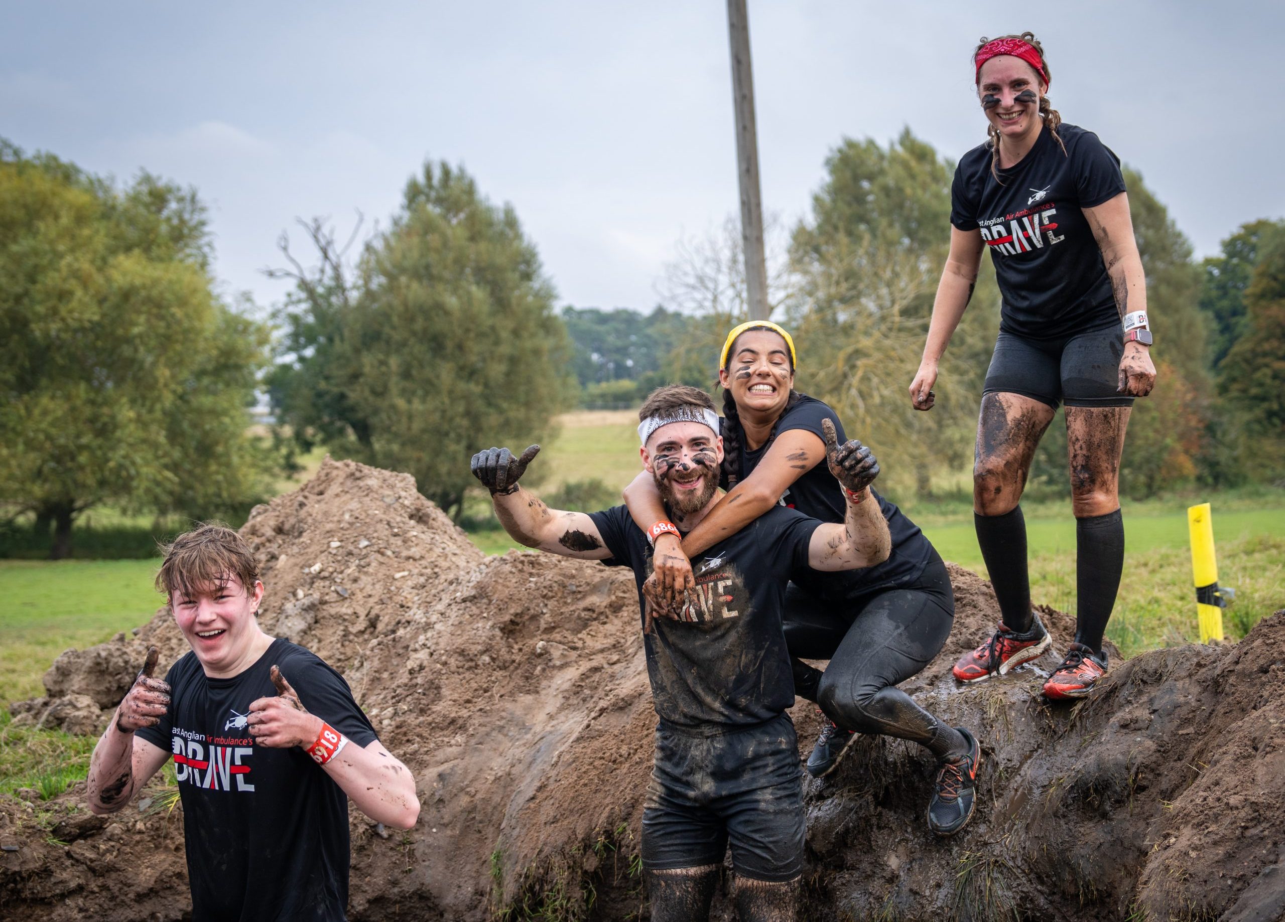 Thumbs up in the mud at only the brave